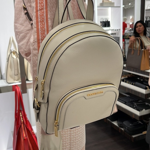 Michael Kors Jaycee Medium Pebbled Leather Backpack
Light Cream - Picture 16 of 16